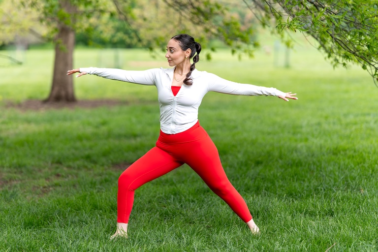 Sarah guiding a yoga posture